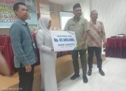 Pj Bupati Aceh Timur Serahkan Santunan Kematian BPJS KetenagakerjaanSaiful Alam. SE Santunan