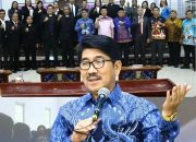 Bupati Lampung Utara Hamartoni Ahadis didampingi Sekretaris Daerah Menghadiri Pelantikan MPH PGID