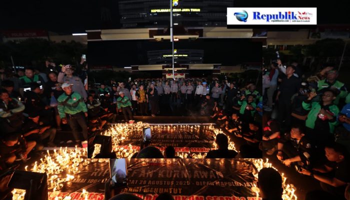 Driver Ojol Gelar Aksi Damai 1000 Lilin di Depan Mapolda Jatim
