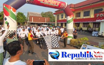Foto : Kapolres Pasuruan,AKBP Harto Agung gowes bersama ulama dan masyarakat.