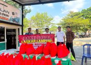 LASKAR LAMPUNG GELAR BAKTI SOSIAL, BAGIKAN SEMBAKO KEPADA WARGA MEMBUTUHKAN