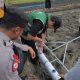 Bhabinkamtibmas Ketegan Kawal Tanam Padi Modern, Dukung Ketahanan Pangan Nasional